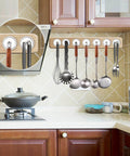 Beefy Six Pack Neodymium Cup Magnets Set With 110 Pound Holding Power used for hanging utensils in a kitchen