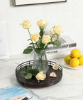 12 Inch Dark Mahogany Lazy Susan Turntable Organizer With Black Metal Frame For Tabletop, vase with flowers on rotating tray