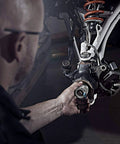 Mechanic installing 44mm Wheel Bearing Greaser For Polaris RZR 900 1000 And Pro XP Jansen Motorsports Wheel Bearing Grease Packer