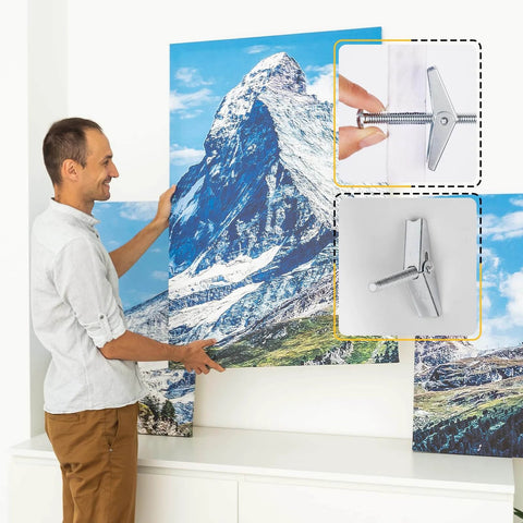 Man using 28PCS Toggle Bolts, Wing Nuts, Heavy Duty Hollow Wall Anchors for Drywall Ceiling to hang mountain picture