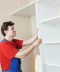 Person installing 16Feet Weather Stripping Seal (1/2 Inch X 1/4 Inch) for Door Window, high density foam tape on white shelf, side view