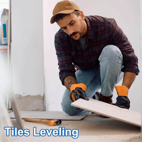 Man using shims for tiles leveling in construction project