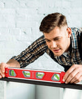 Person using 12 Inch Torpedo Level, Magnetic Small Leveler Tool, Plumbing Level with Pitch Vial, Aluminum Reinforced, 4 Bubbles, V-Groove.