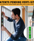 Man using a digital level with 11.5 inch LCD display and 360 degree inclinometer for vertical and horizontal angles, checking plumb.