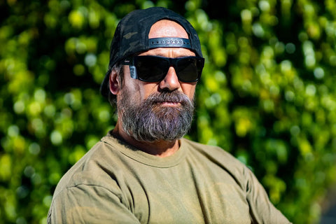 Man wearing Unisex Safety Glasses With Matte Black Frame And Removable Side Shields Z87 outdoors