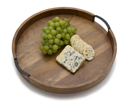 18 inch mango wood lazy susan serving tray with high wall, featuring grapes, cheese, and crackers on a round surface.