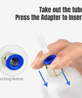 Detail of 200cc Manual Fluid Extractor Pump connection with PVC suction tube and adapter, locking button shown.