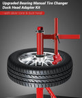 Bearing Manual Tire Changer Duck Head Adapter Kit with Silver Cone holding car tire, close view