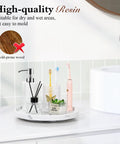 360 Degree Turntable Lazy Susan for Tabletop and Cabinet Organization Marble Round Tray 10.63 Inch Non Slip Kitchen Pantry Organizer Rotating Bathroom Countertop Storage Gravel White with bathroom essentials displayed on white countertop.