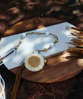Large Marble And Acacia Wood Lazy Susan Turntable with decorative beads and flower accents