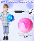 Boy holding a blue 2PCS Inflatable Playground Ball, 8.7 Inch Marbleized Bouncy Ball, with pink ball and pump shown