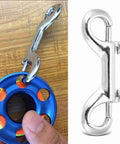 Hamwesh double-ended stainless steel snap hook attached to rope and blue pulley; chrome trigger snap hook close-up.