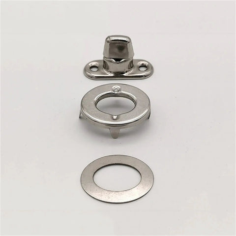 Front view: stainless steel twist-lock canvas fasteners; marine-grade base plate, turn-button stud, eyelet, and washer.