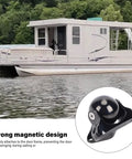 Boat on water with inset close-up of Luocute marine magnetic door stopper, 316 stainless steel door catch.