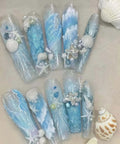 Marine Elements Nail Mold Set Silicone Molds For 3D Nail Art With Shells Anchors Starfish Wave Designs Teeth And Wind Chimes displayed