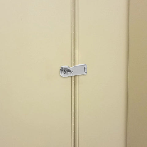 Marine-grade stainless steel gate latch hasp with swivel padlock eye mounted on beige double doors