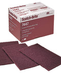 Maroon General Purpose Hand Pads 6x9 Perforated Nonwoven Abrasive Pack of 20 with box and three pads displayed
