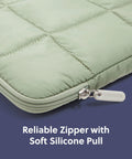 Close-up of Matcha Green Puffy Nylon Laptop Sleeve With Zipper Medium 13 Inch Case detail showing reliable zipper and soft pull.