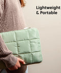 Person holding Matcha Green Puffy Nylon Laptop Sleeve With Zipper Medium 13 Inch Case Fits Up To 14 Inch Laptops