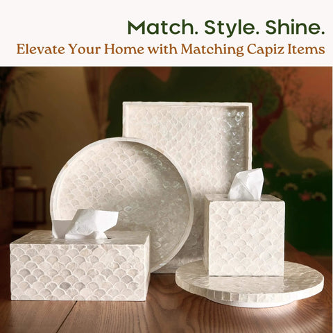 12 inch white capiz lazy susan turntable centerpiece and matching capiz decor items arranged elegantly.