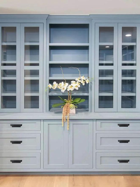 Blue cabinets with 10 Pack 3 Inch Center To Center Matte Black Cabinet Cup Pulls For Drawers And Cabinets installed, elegant modern hardware.