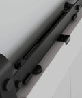 N700-112 Interior Sliding Barn Door Hardware Soft Close Kit Matte Black installed on white door showing top track