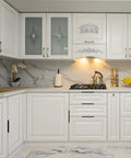 White kitchen with 30 Pack Matte Black Aluminum Cabinet Handles 5.9 Inch Flat Back Hidden Back Mount Finger Pulls visible on drawers.