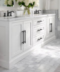 Bathroom cabinet with matte black hardware featuring 20-Pack Matte Black Cabinet Knobs For Kitchen Cabinets And Drawers, Dresser, Bathroom and Closet.