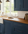 Kitchen with blue cabinets featuring 10 Pack Matte Black Cabinet Pulls With 5 Inch Center to Center Hole Spacing Heavy Duty Solid Zinc Alloy.