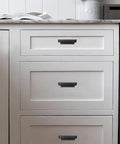 Installed 10 Pack 3 Inch Center To Center Matte Black Cabinet Cup Pulls For Drawers And Cabinets on white kitchen drawers