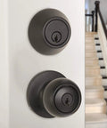 Secure exterior door entry with a durable knob and deadbolt, keyed alike for easy access, coastal matte black finish, installed on door