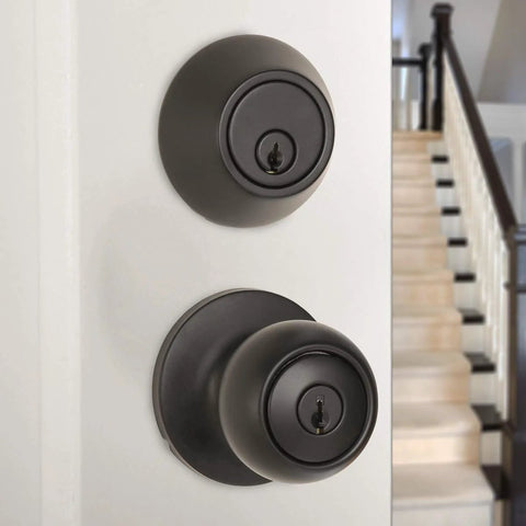 Secure exterior door entry with a durable knob and deadbolt, keyed alike for easy access, coastal matte black finish, installed on door