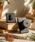 Matte Black Exterior Door Lock Set With Square Contemporary Knob And Deadbolt, Heavy Duty Front Door Hardware placed on books