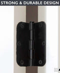 Close-up of matte black interior door hinge installed, featuring 18 Pack Matte Black Interior Door Hinges 3 1/2 By 3 1/2 Inches With 5/8 Radius Corners For Doors, Closets, And Bathrooms — Sturdy, Smooth-Swing Hinges For Home, Cabinets, Wardrobe Projects.