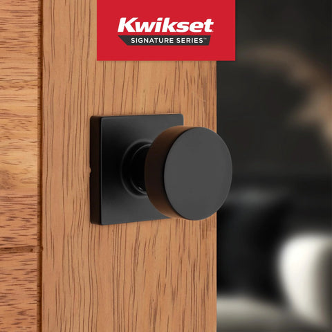 Non Locking Matte Black Interior Passage Door Knob With Microban Protection installed on wood door.