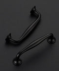 10 Pack Matte Black 3-3/4 Inch Kitchen Cabinet Handles Solid Zinc Alloy Cupboard And Drawer Pulls on black surface