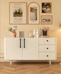 Stylish white sideboard with 10 Pack Matte Black Kitchen Cabinet Knobs 1 1/5 Inch 30mm, enhancing a modern dining room setup.