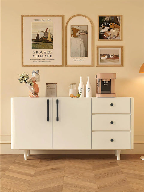 Stylish white sideboard with 10 Pack Matte Black Kitchen Cabinet Knobs 1 1/5 Inch 30mm, enhancing a modern dining room setup.