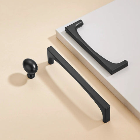 10 Pack Matte Black Oval Cabinet Knobs Single Hole Cabinet Pulls showcased with dresser unit, made of solid zinc alloy for modern home use.