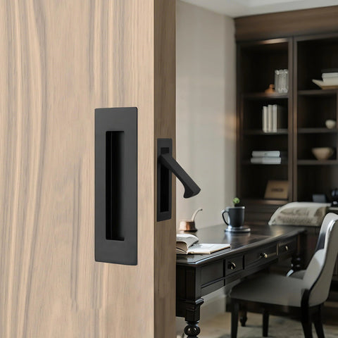 Matte Black Stainless Steel Pocket Door Pull And Edge Pull Set installed on a recessed sliding door in home office
