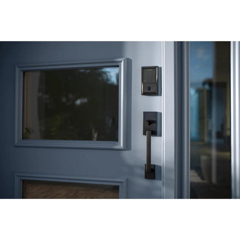 Smart WiFi Front Door Deadbolt With Keyless Entry App Remote Locking Voice Control Works With Alexa Google Assistant And Airbnb Create Up To 100 Guest Codes Matte Black Finish for easy home access management installed on a front door