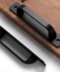 12 Pack 5 Inch Matte Black Square Cabinet Handles With Base Plate Aluminum Drawer Pulls And Sliding Door Pulls For Cabinets And Furniture Includes 24 Screws And Easy Drill Punch Free Installation showcasing front and top views of handles on wood.