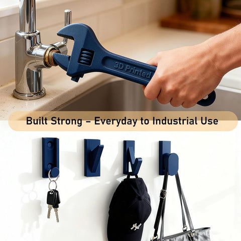 Hand using blue 3D printed wrench on faucet, showcasing strength and utility; wall hooks with keys and hat displayed below.