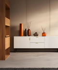 Edge Finger Tab Cabinet Pulls Pack of 10 Aluminum Hidden Door Handles in Modern Matte Brass installed on white cabinets