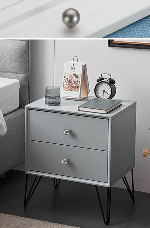 Close-up view of matte gray cabinet knob on drawer, featuring 5 Pack Matte Gray Cabinet Knobs 0.94 Inch Diameter Zinc Alloy Round Ball Drawer Pulls With Screws