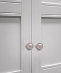 5 Pack Matte Gray Cabinet Knobs 0.94 Inch Diameter Zinc Alloy Round Ball Drawer Pulls With Screws installed on white cabinet doors