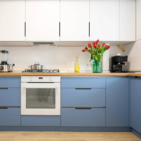 Modern kitchen with white cabinets and blue drawers featuring 10 Pack Edge Drawer Pulls For Cabinets Matte White Aluminum Finger Pulls