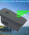 Two Pack 3830mAh 11.4V Intelligent Flight Batteries For Mavic Pro Series Including Pro, Pro Platinum, And Pro White Replacement Power For Extended Flight Time, Smart Battery Features, And Strict Quality Testing For Safe, Reliable Operation showing LED indicator lights against a coastal landscape.