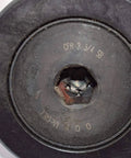 Close-up of a Mcgill cfh 2 3/4 sb – flat cam follower – heavy stud type showing center details and text marking