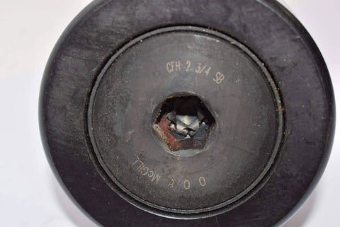 Close-up of a Mcgill cfh 2 3/4 sb – flat cam follower – heavy stud type showing center details and text marking